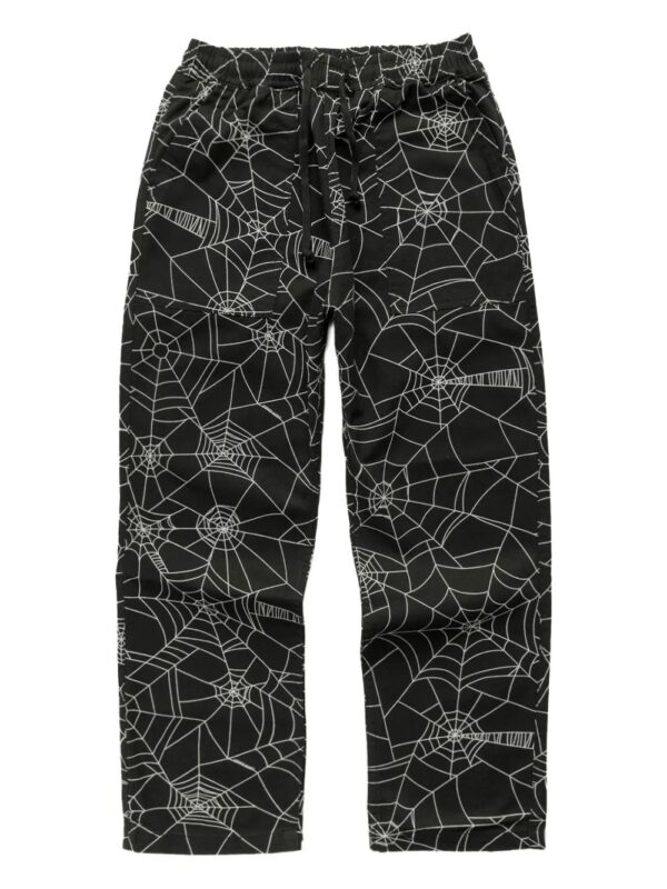 pantalon à motif toile d'araignée
